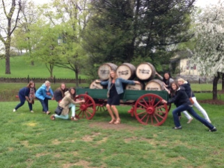 Girls trying to steal a wagon of Maker's Mark barrels!